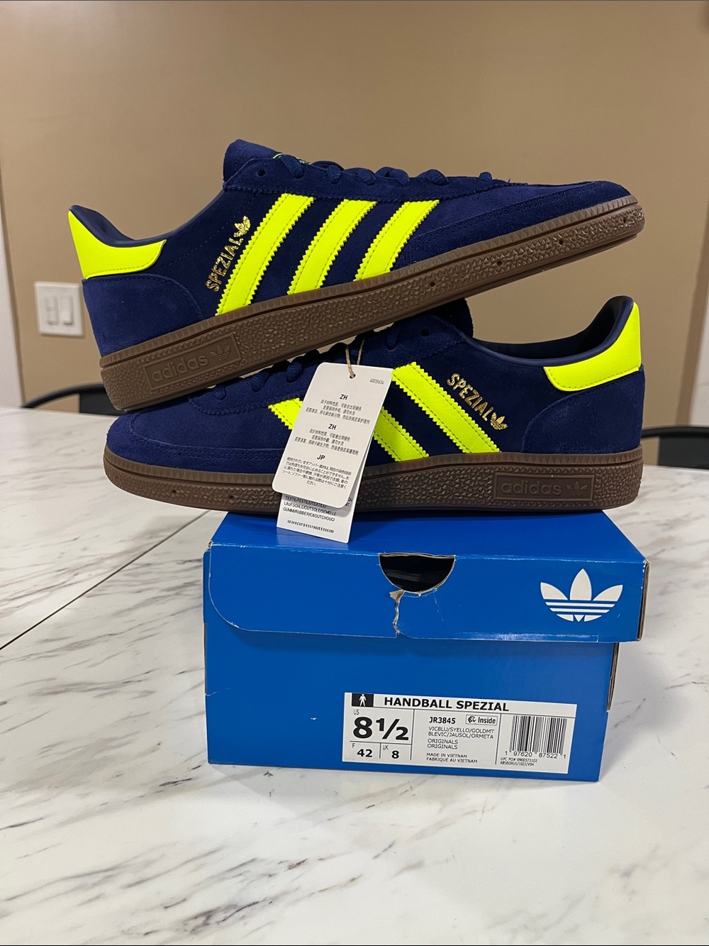 adidas Spezial suede sneakers in navy and neon yellow